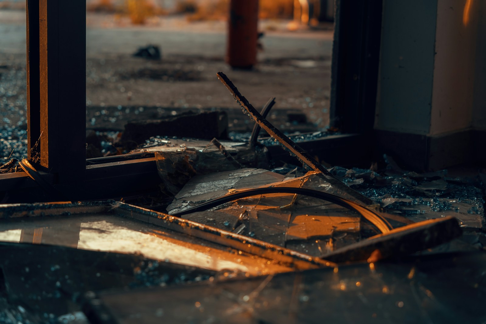 A broken window in an abandoned building